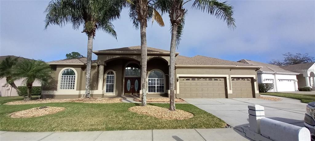 front view of a house with a yard