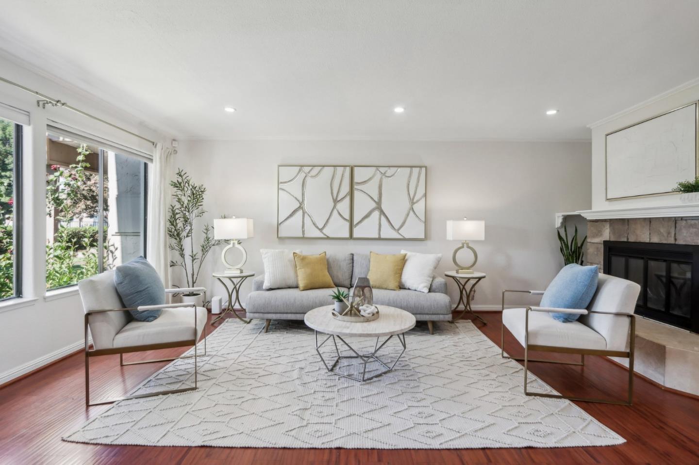 a living room with furniture and a rug