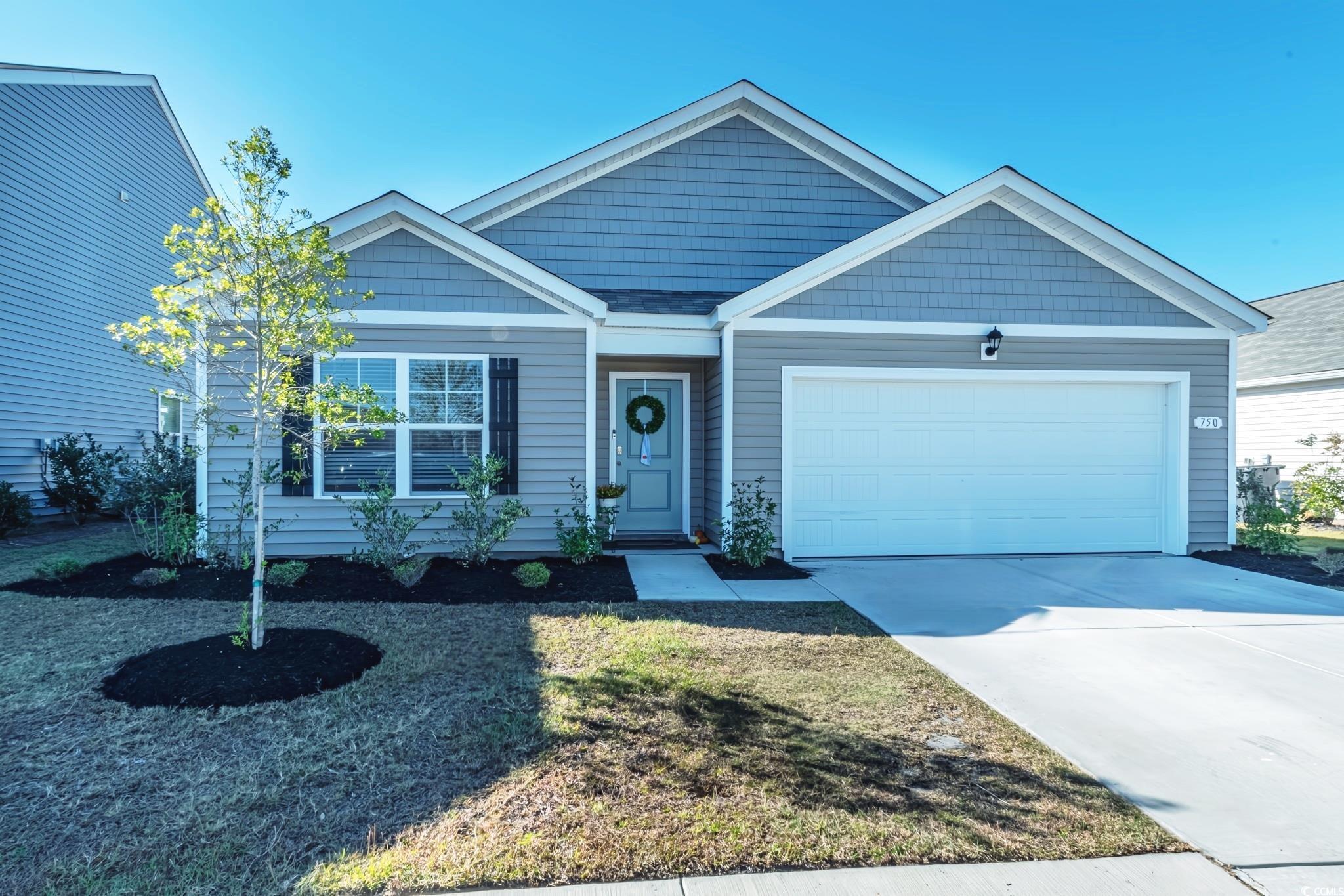 View of front of house with a garage