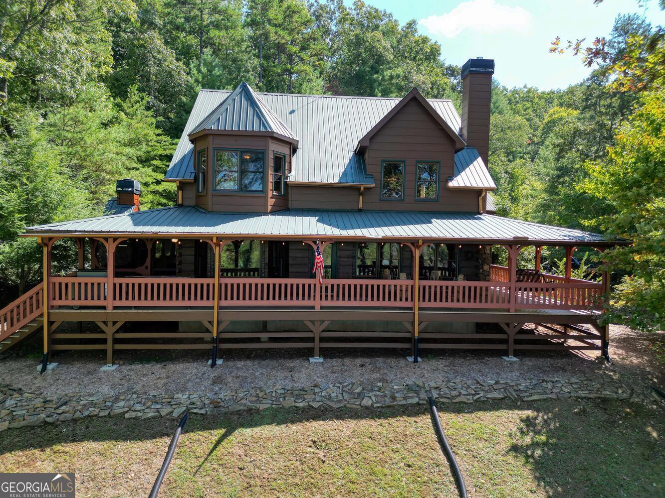 a front view of house with a deck