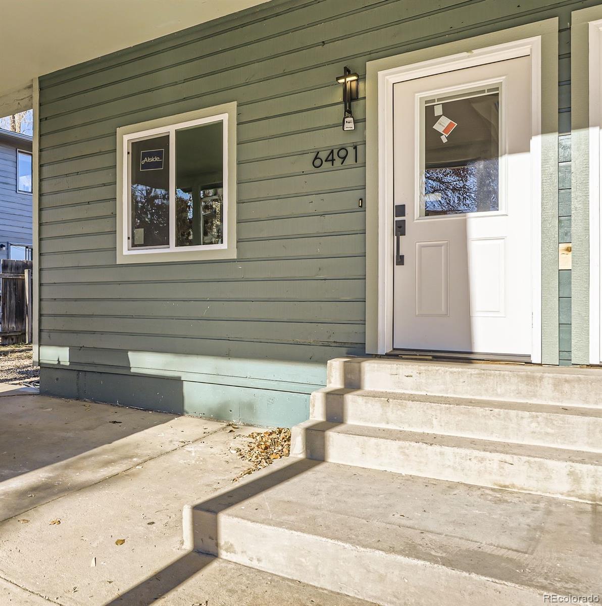 a view of entrance front of house