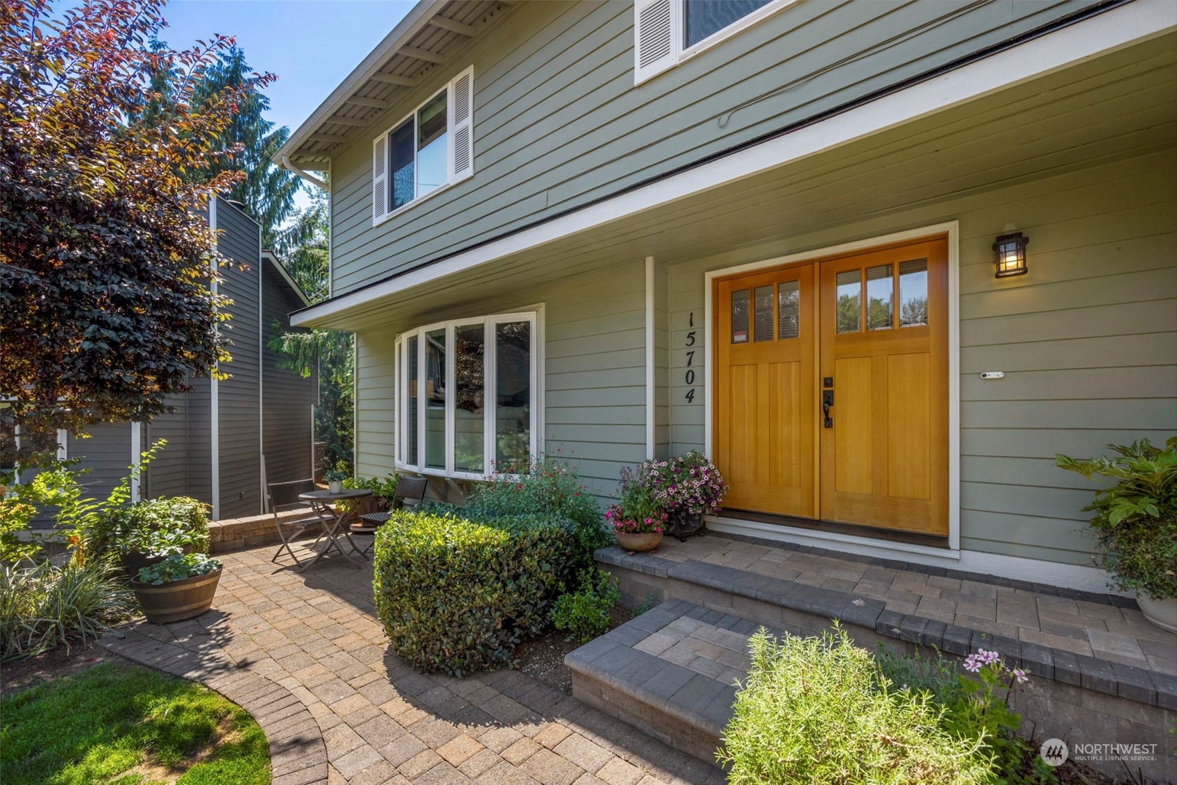 a front view of a house having yard