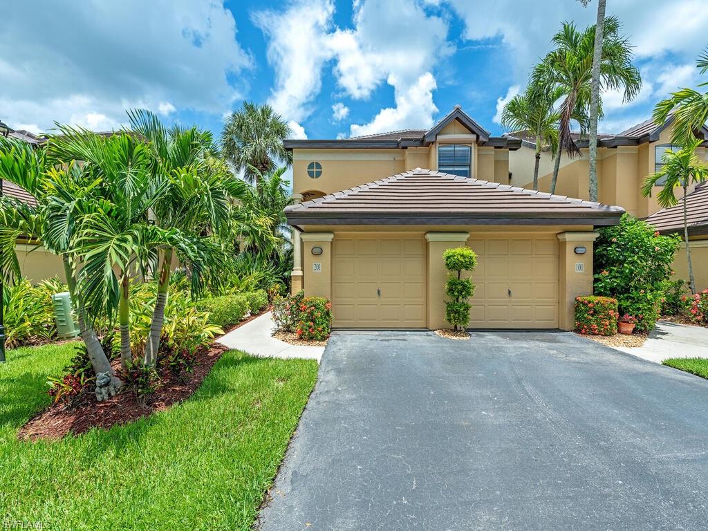 View of front of property with a garage