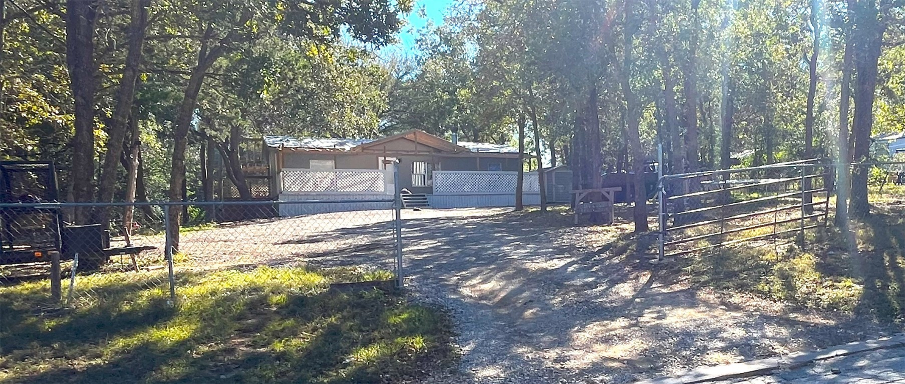 a view of a house with a yard covered with snow