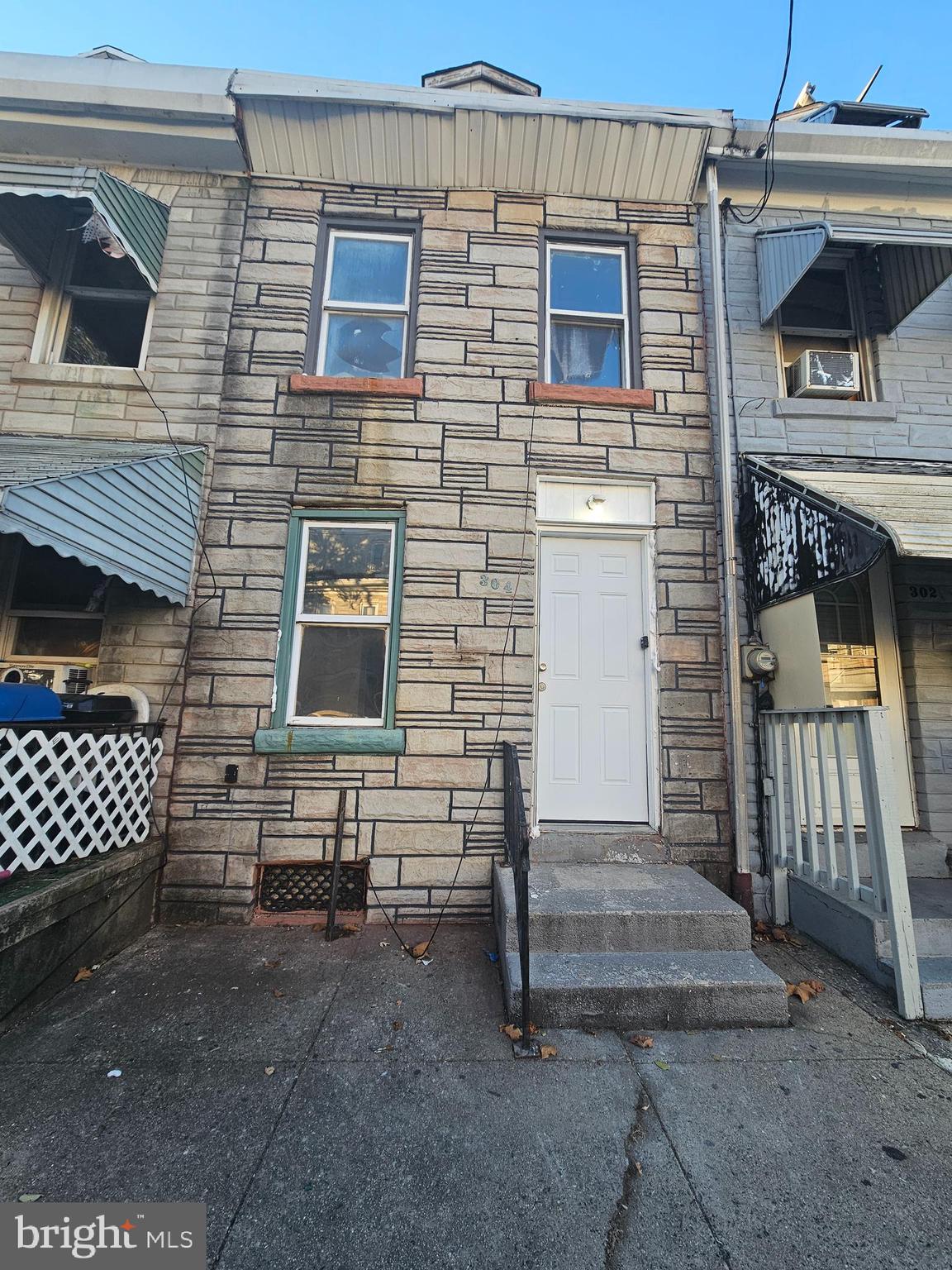 a front view of a house with a garage