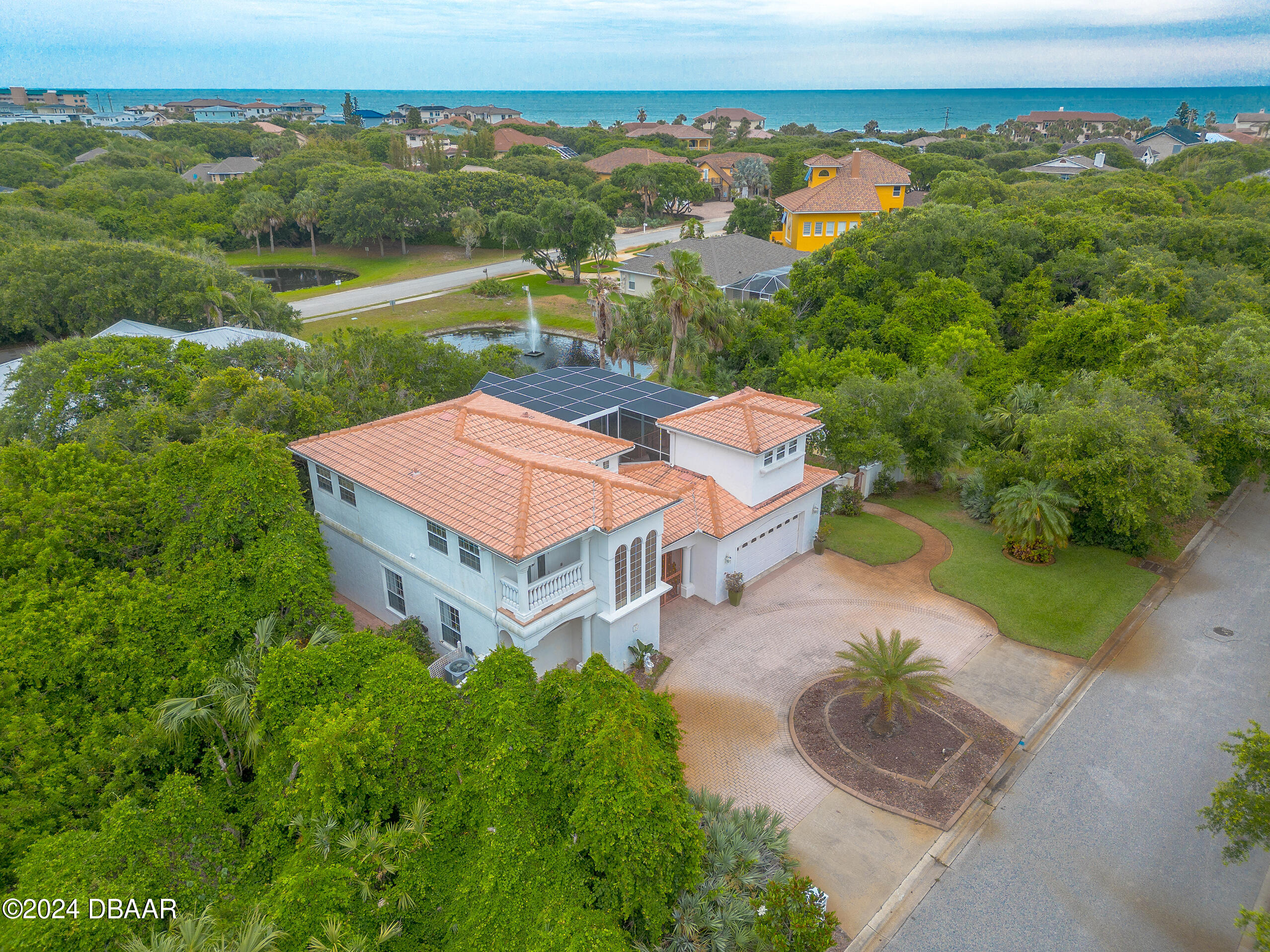 an aerial view of a house with garden space and outdoor space