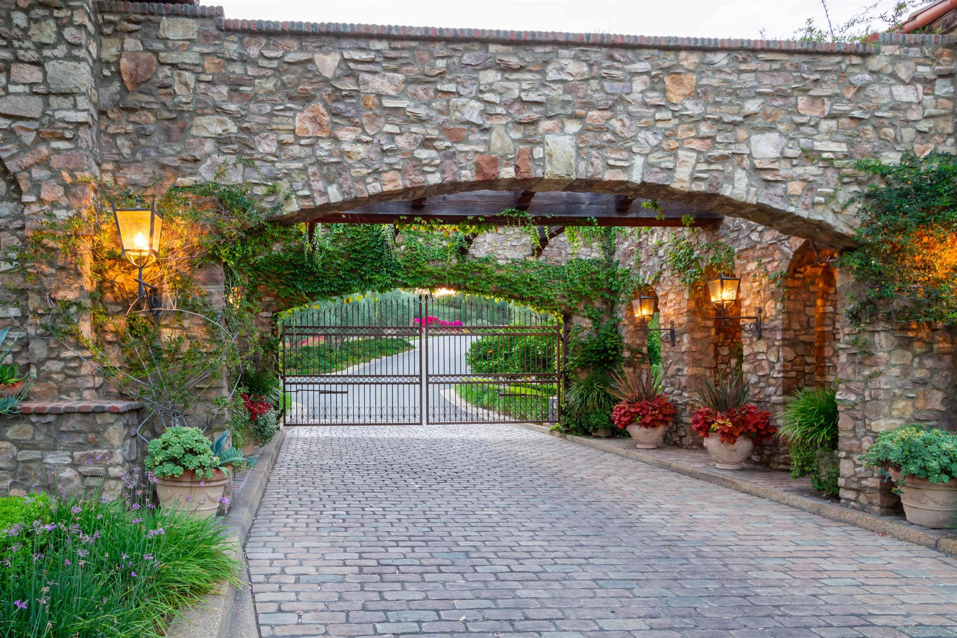 a view of a garden with an outdoor seating