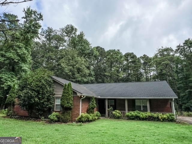 front view of a house with a yard