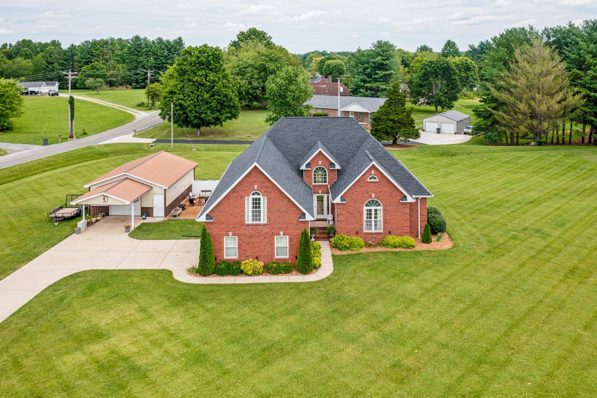 a view of a house with a big yard