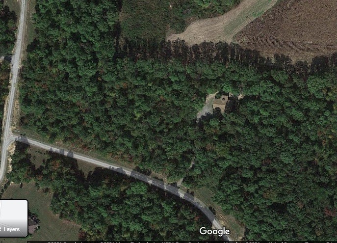 an aerial view of residential house with outdoor space