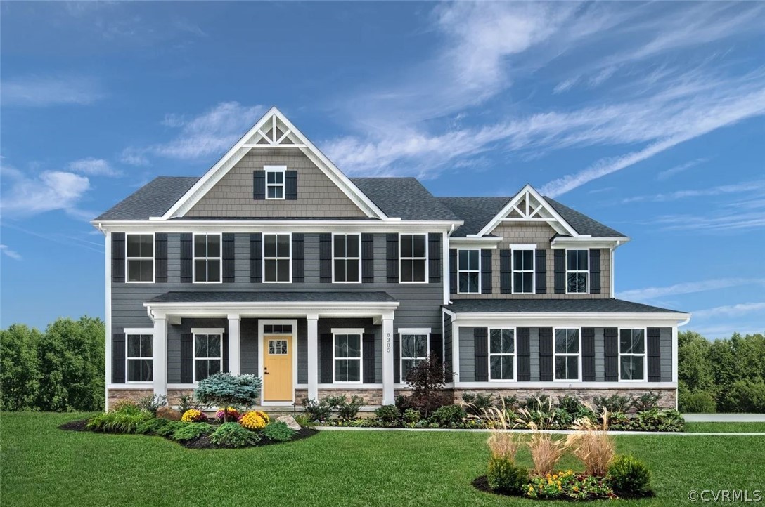 front view of a house with a yard