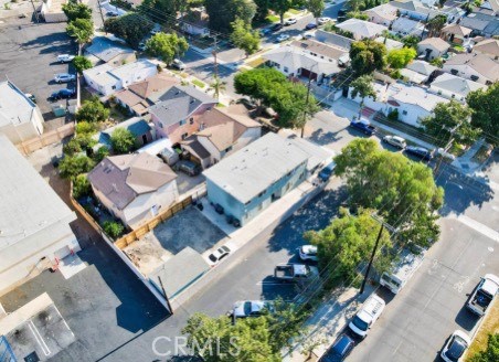 an aerial view of residential house with outdoor space and street view