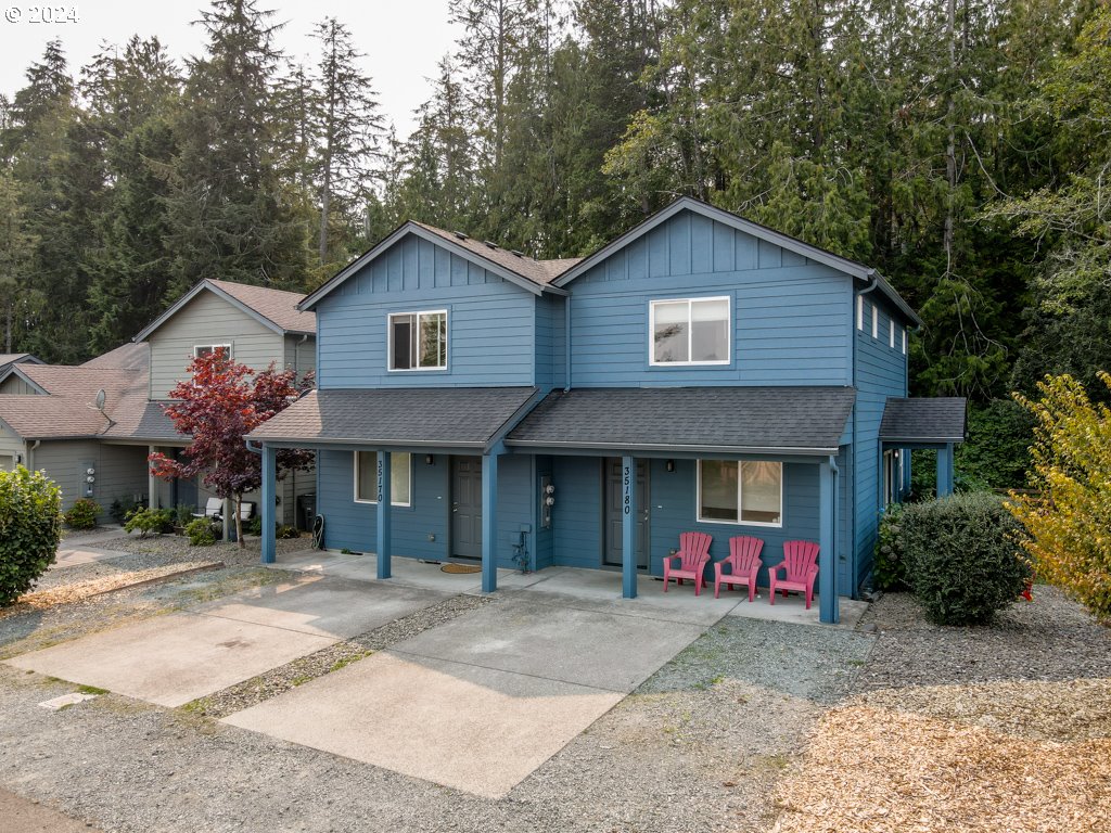 a front view of a house with yard