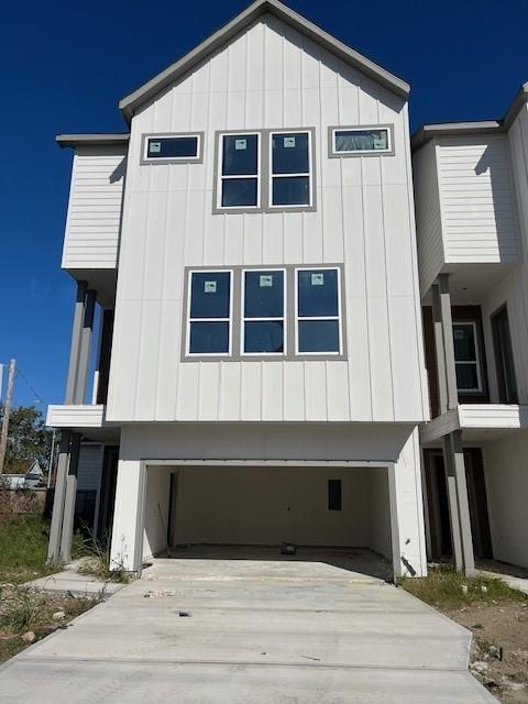 a front view of a house with many windows