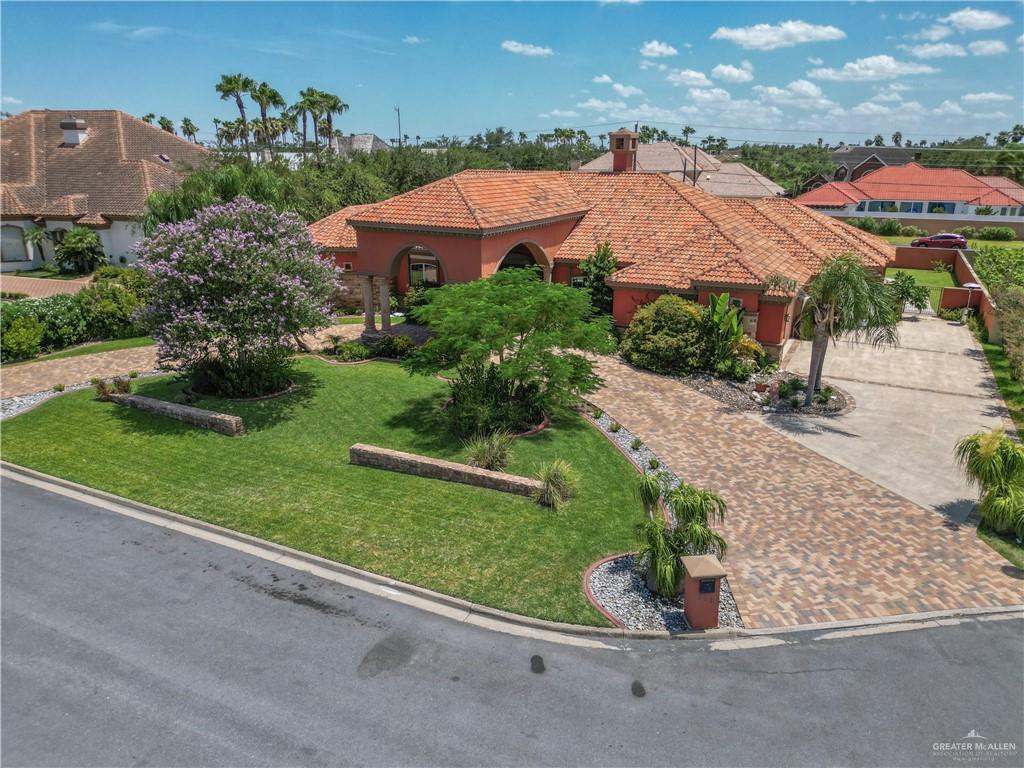 an aerial view of a house with a garden