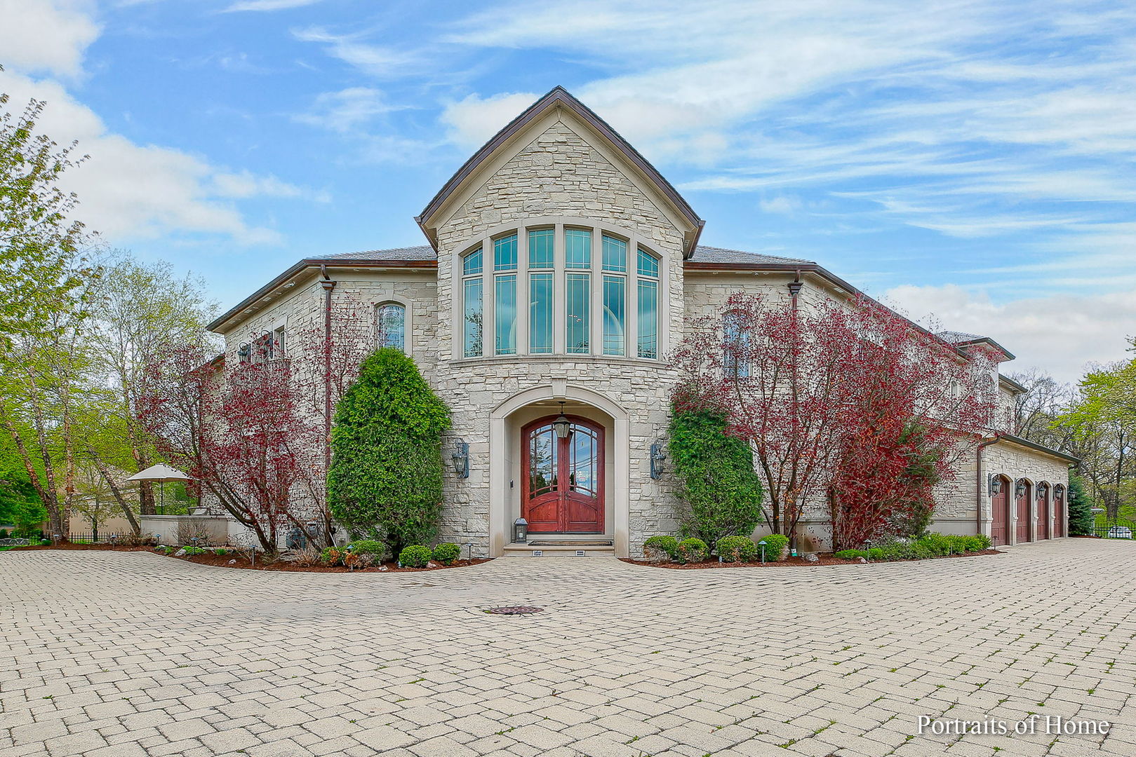 a front view of a house with yard