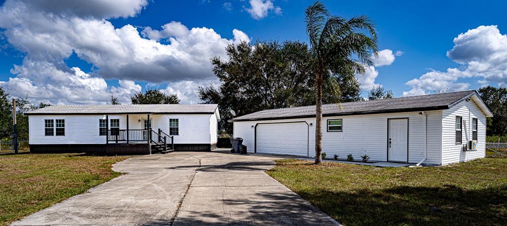 front view of house with a yard