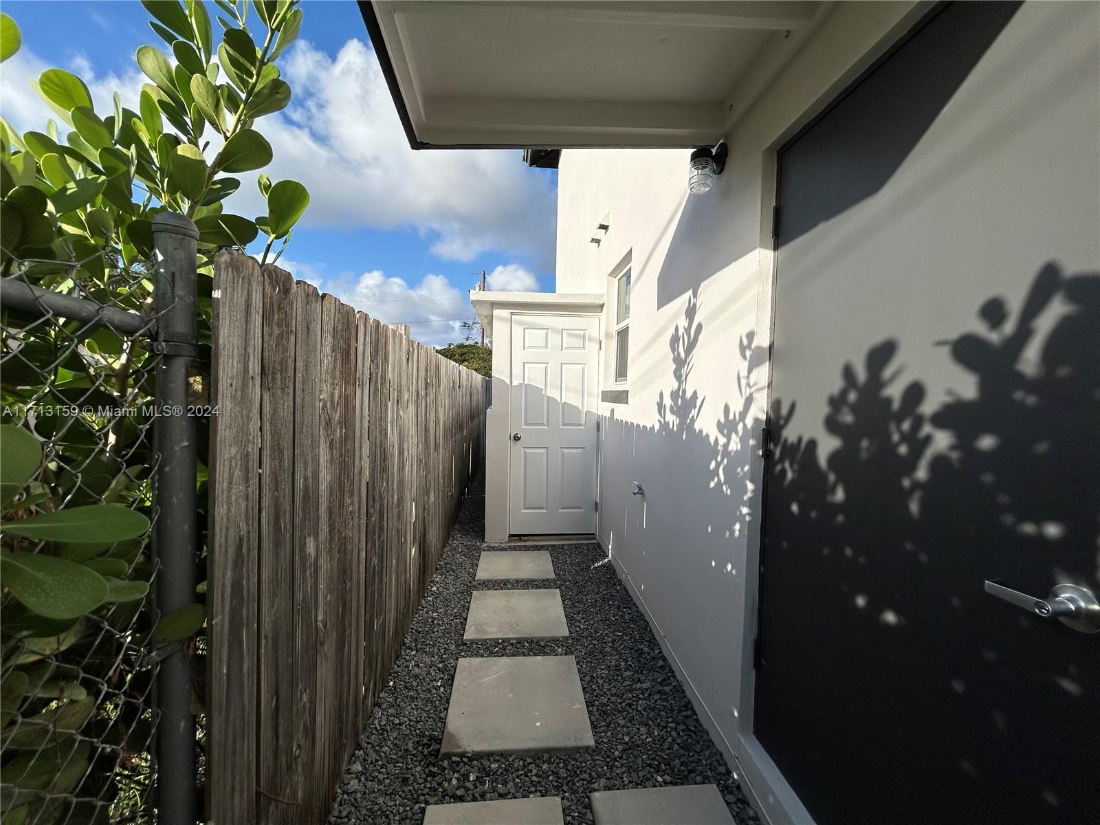 a view of a house with a pathway