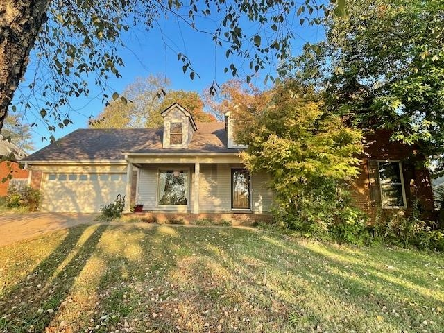 front view of house with a yard