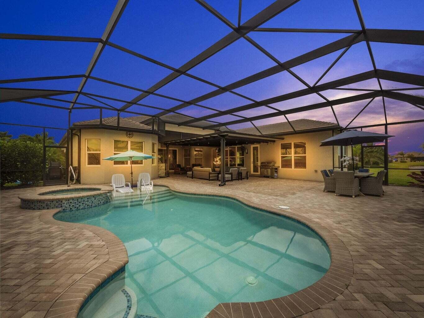 a view of a swimming pool with a patio