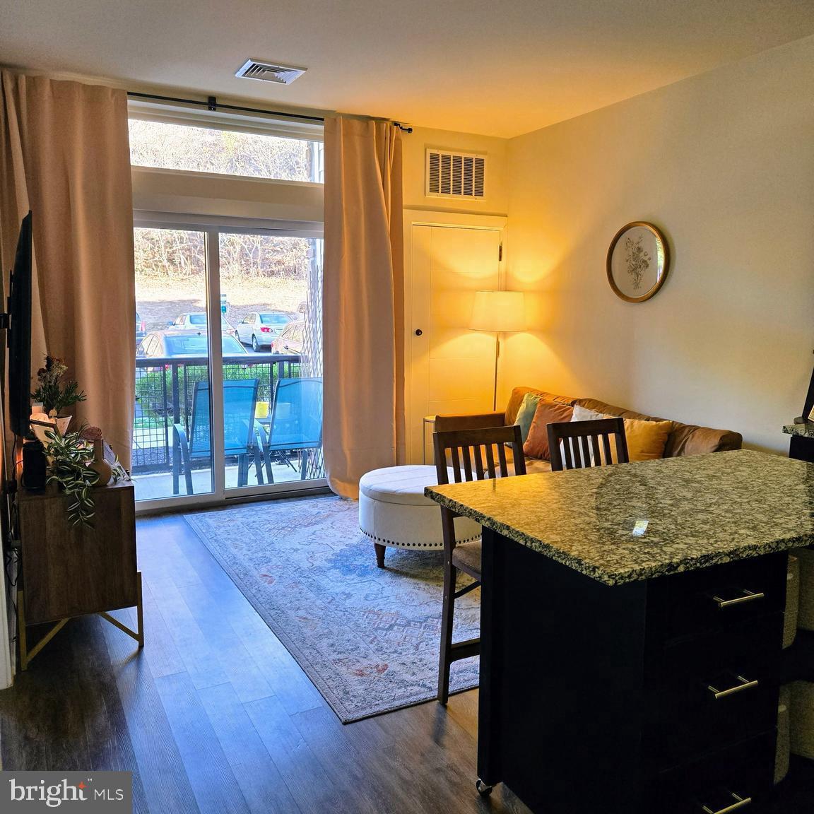 a dining room with table and chairs