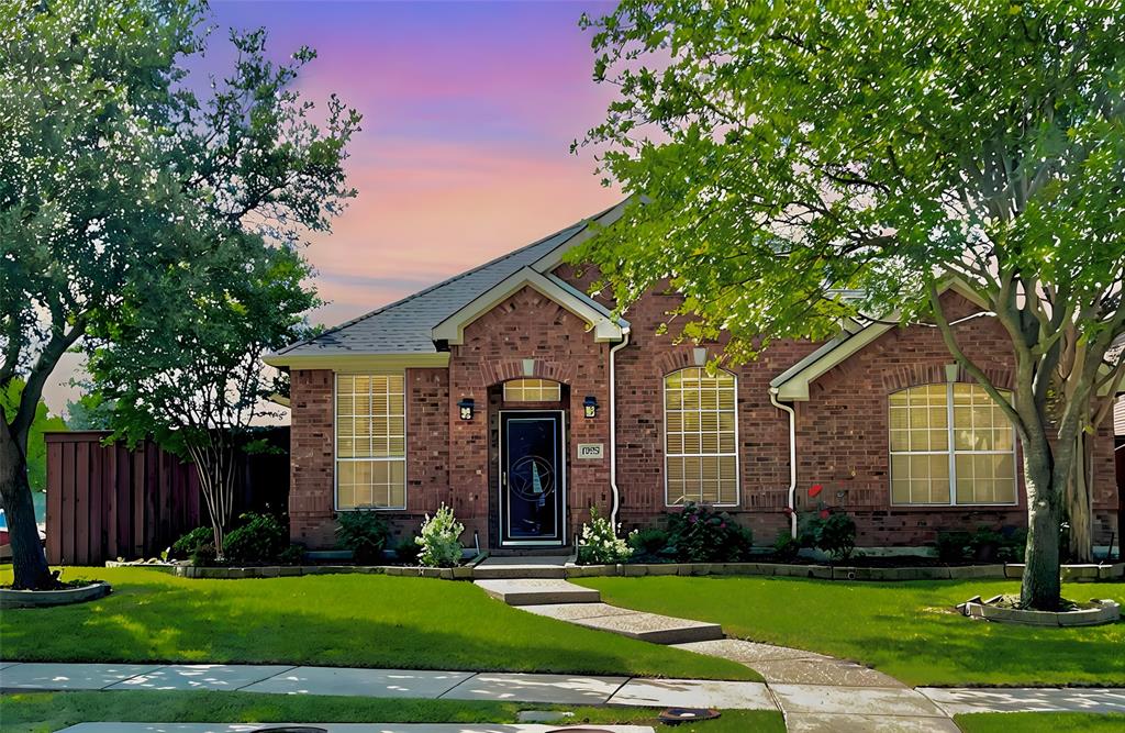 front view of a house and a yard