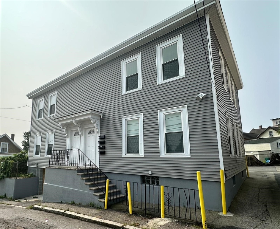 a front view of a house with a garage