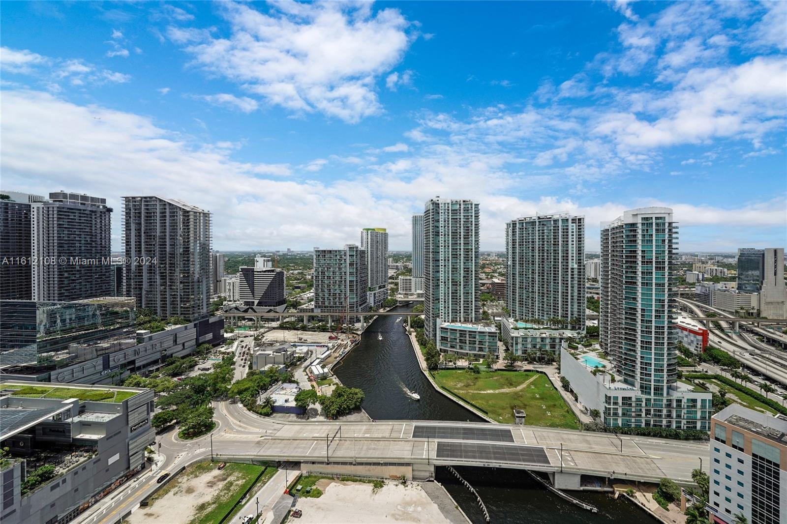 a view of a city with tall buildings