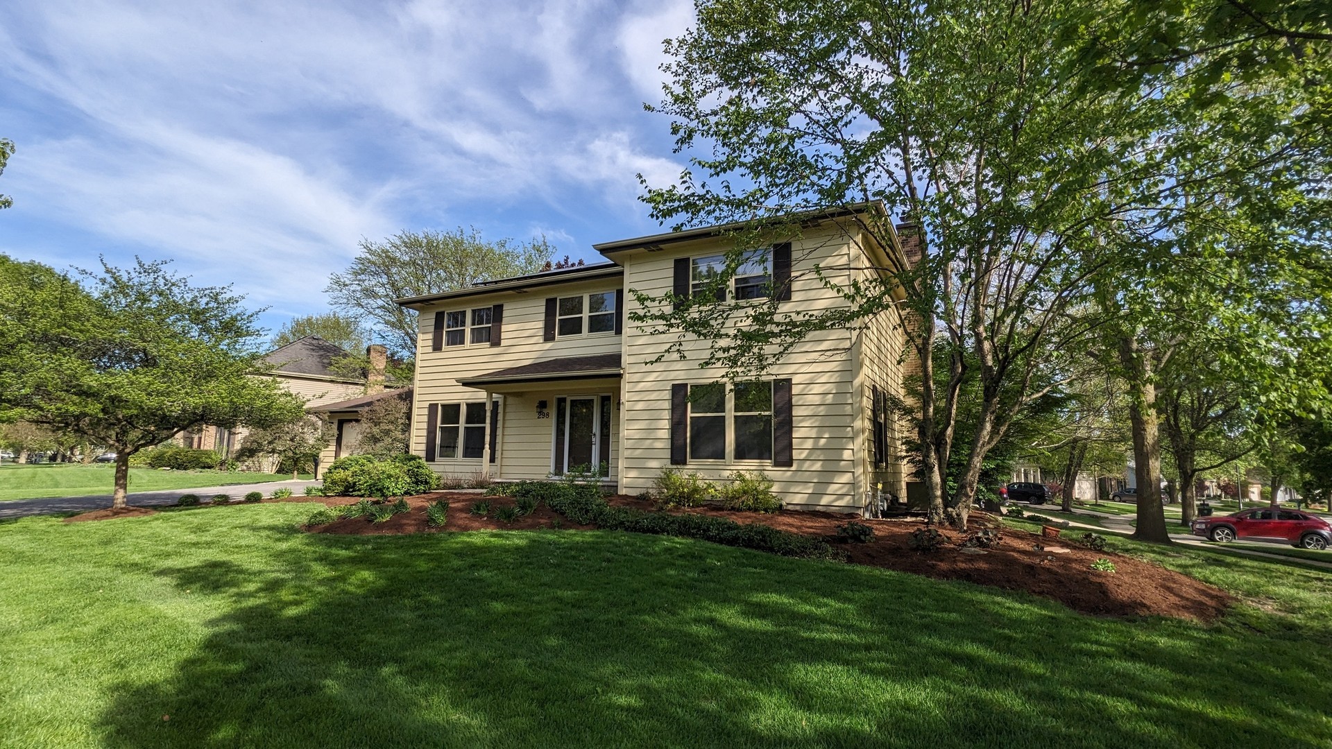 front view of house with a garden