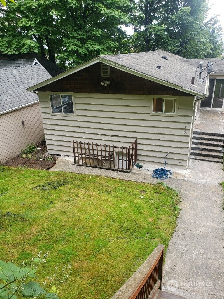 a view of a backyard with a garden