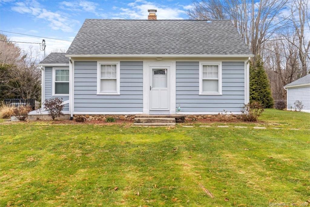 a front view of house with yard