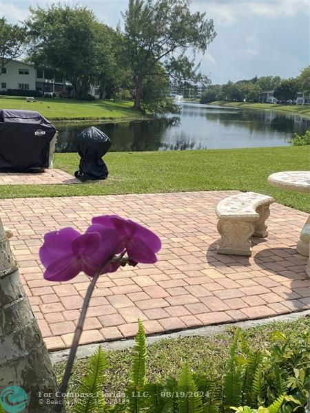 a view of a lake with a big yard