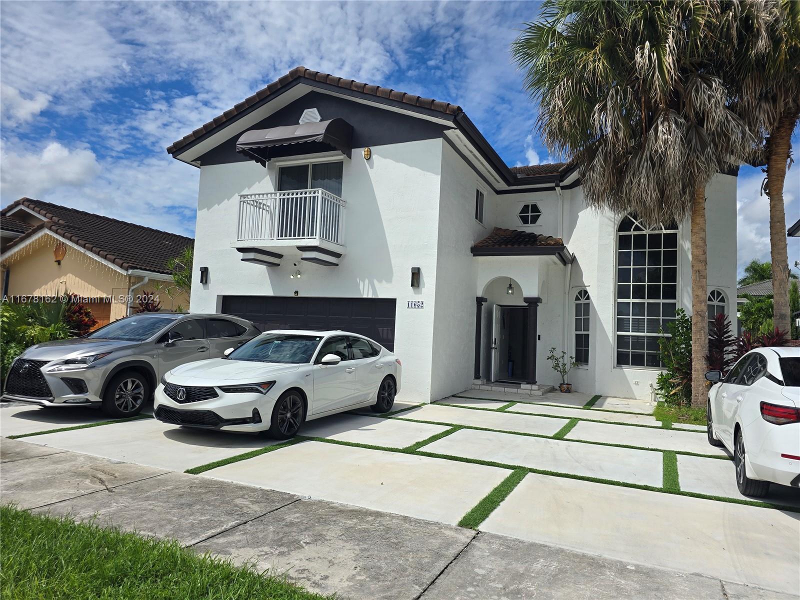 a car parked in front of a house