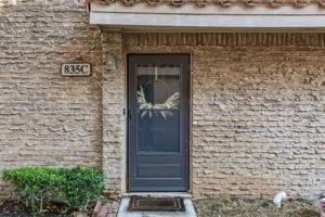 a brick building with a door