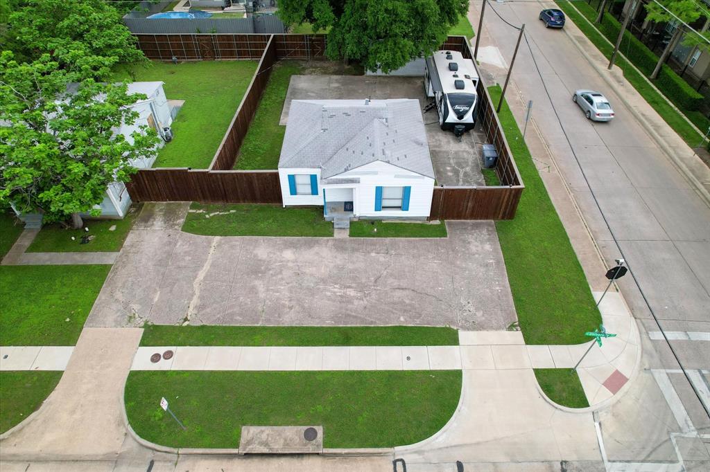 a view of a house with a sink and a yard