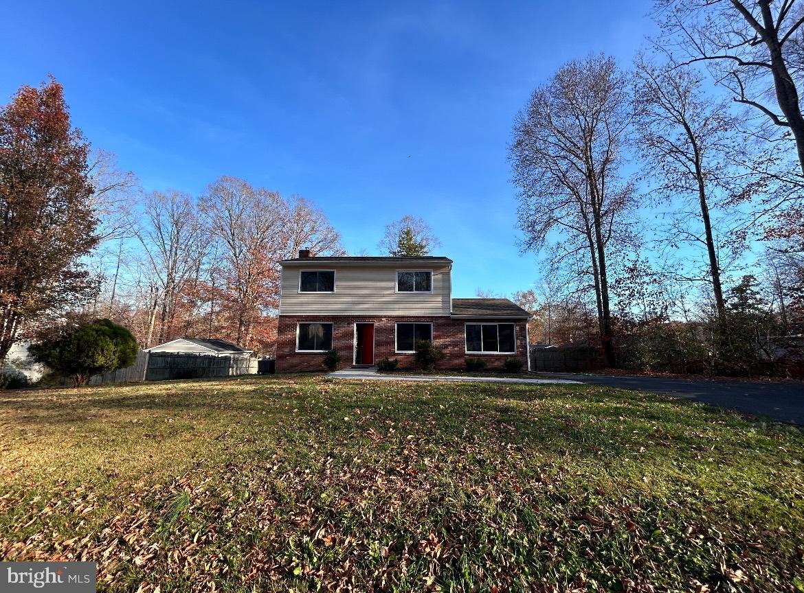 a view of a house with a big yard