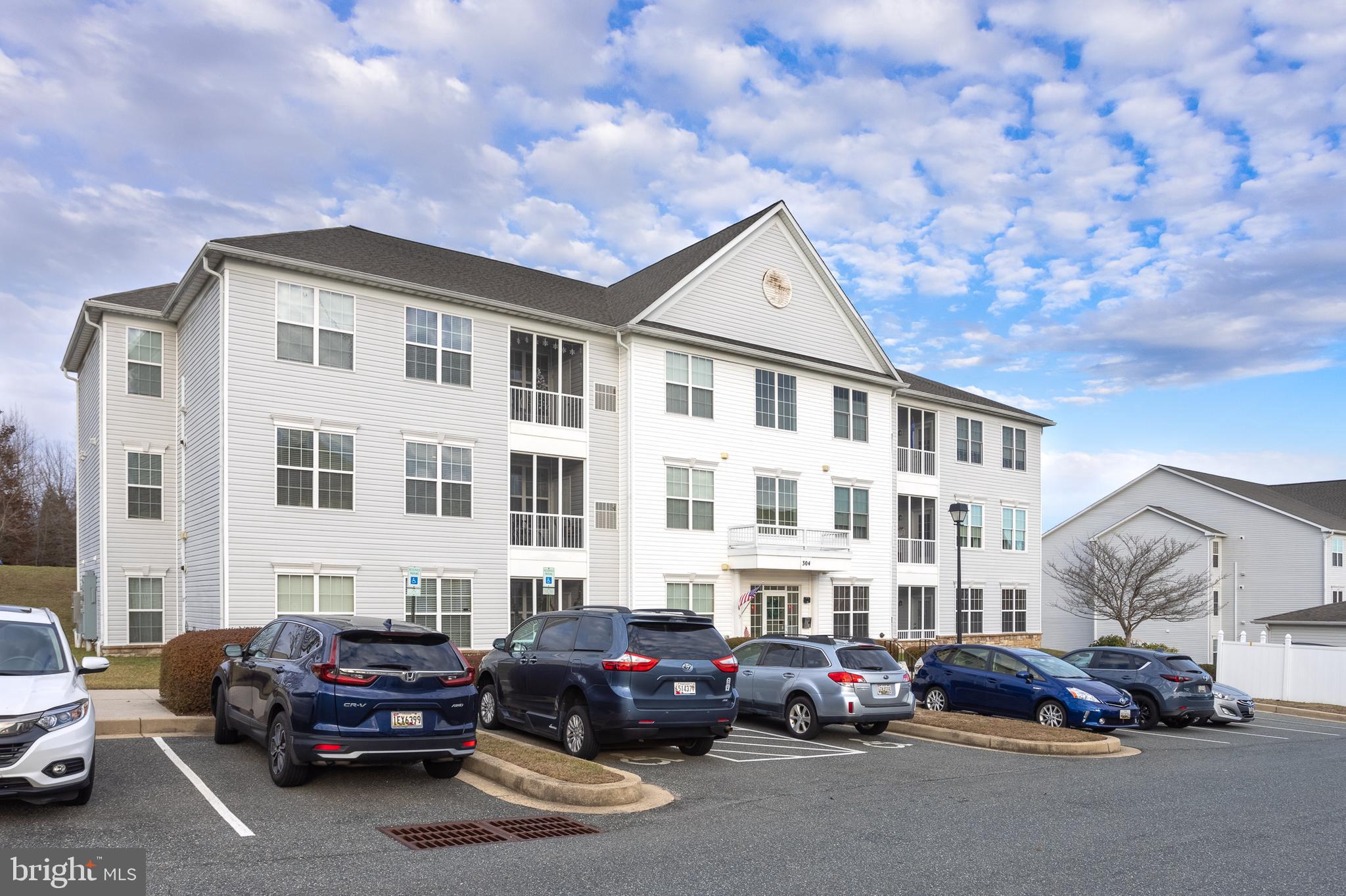 a cars parked in front of a building