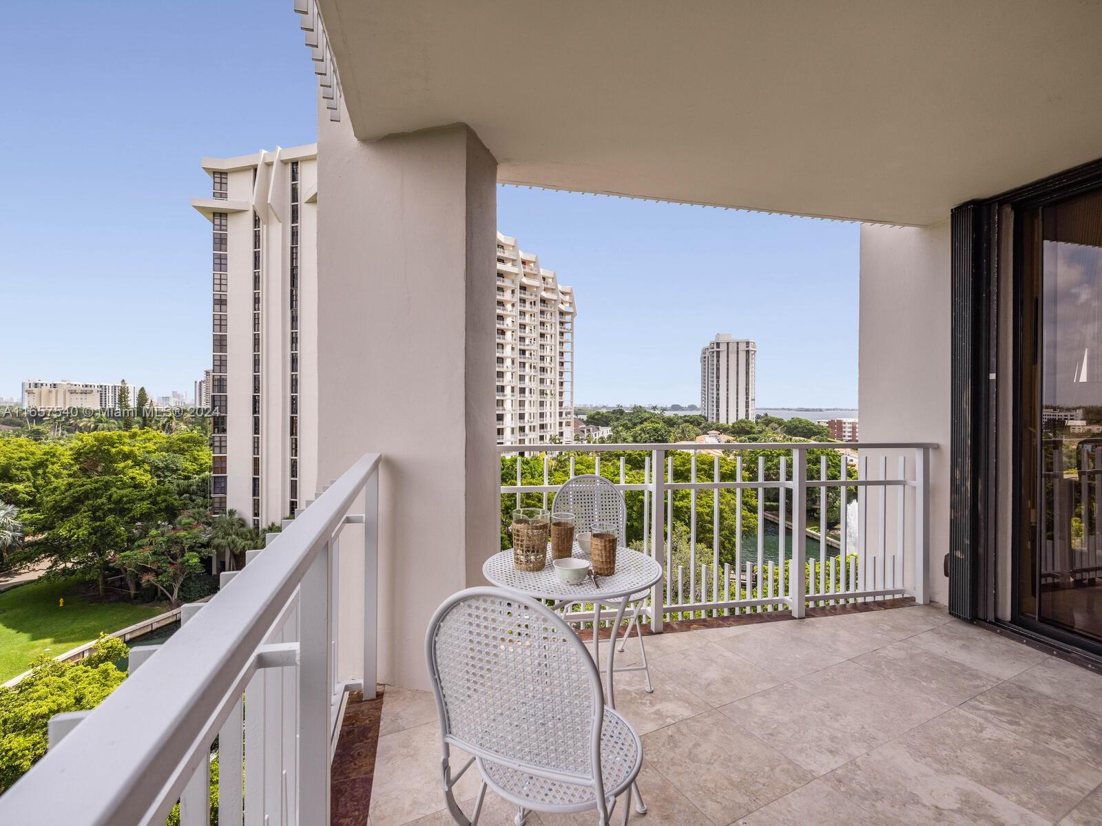 a view of balcony with furniture