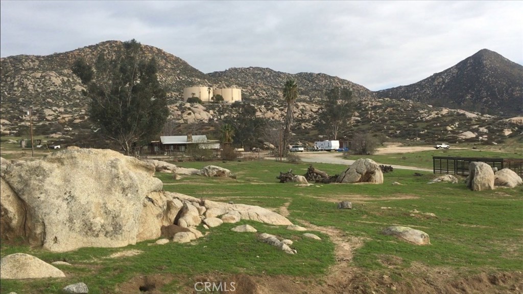 a view of a town with mountains