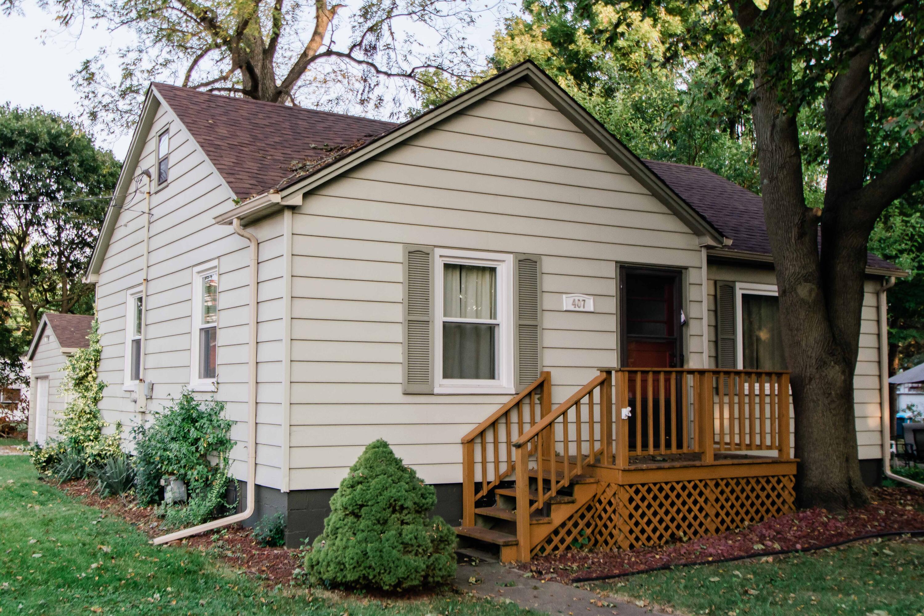 a view of a house with a roof deck