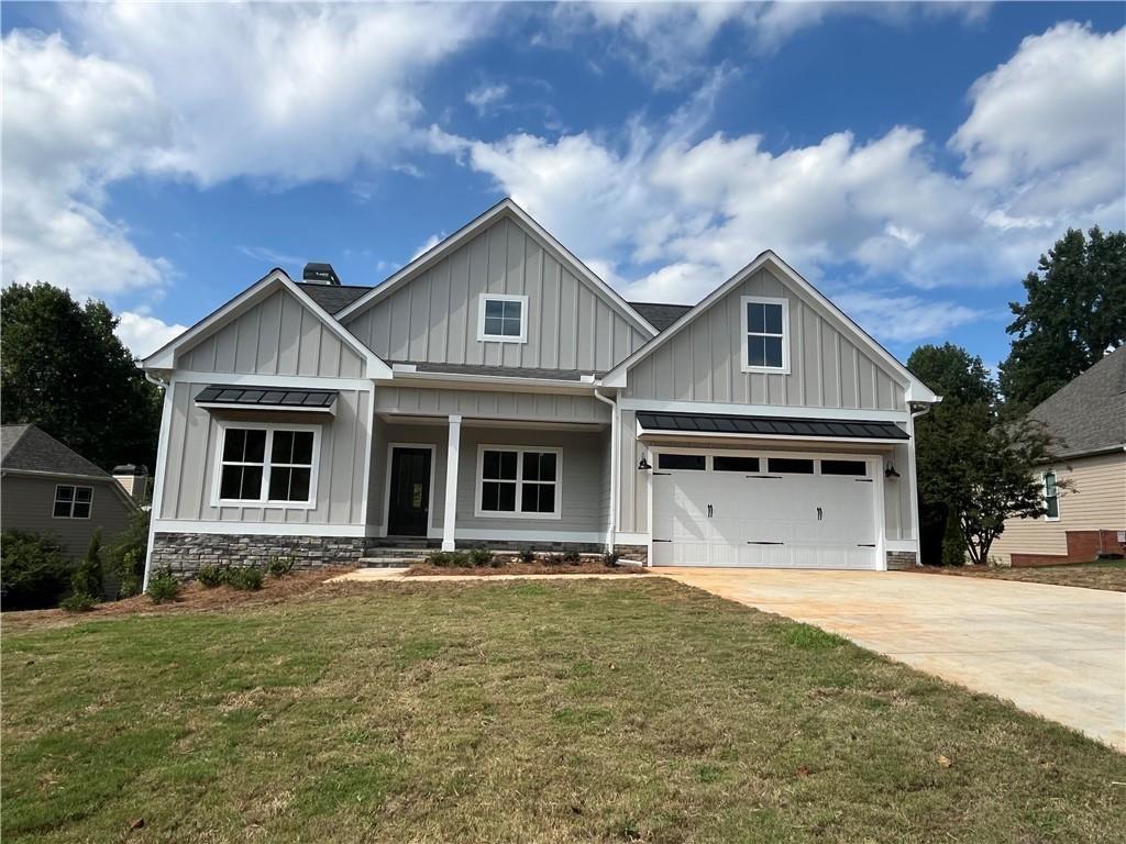 a front view of a house with yard