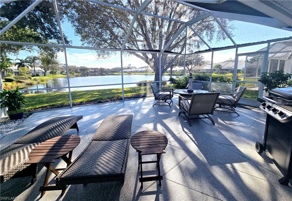 a view of a patio with couches table and chairs