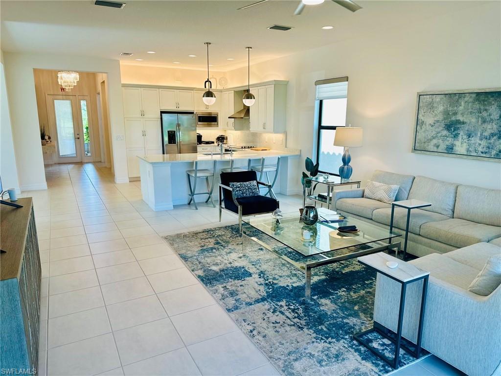 a view of kitchen dining table and a chandelier