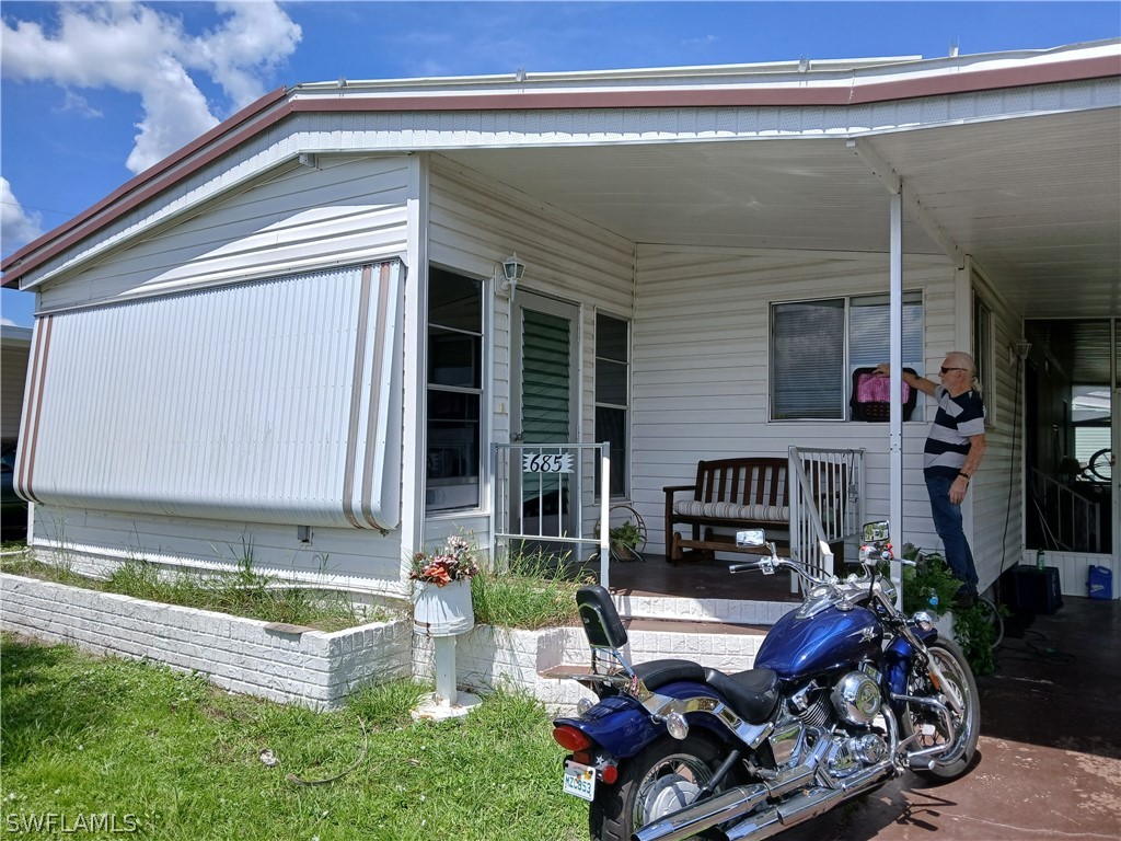 a front view of a house with patio