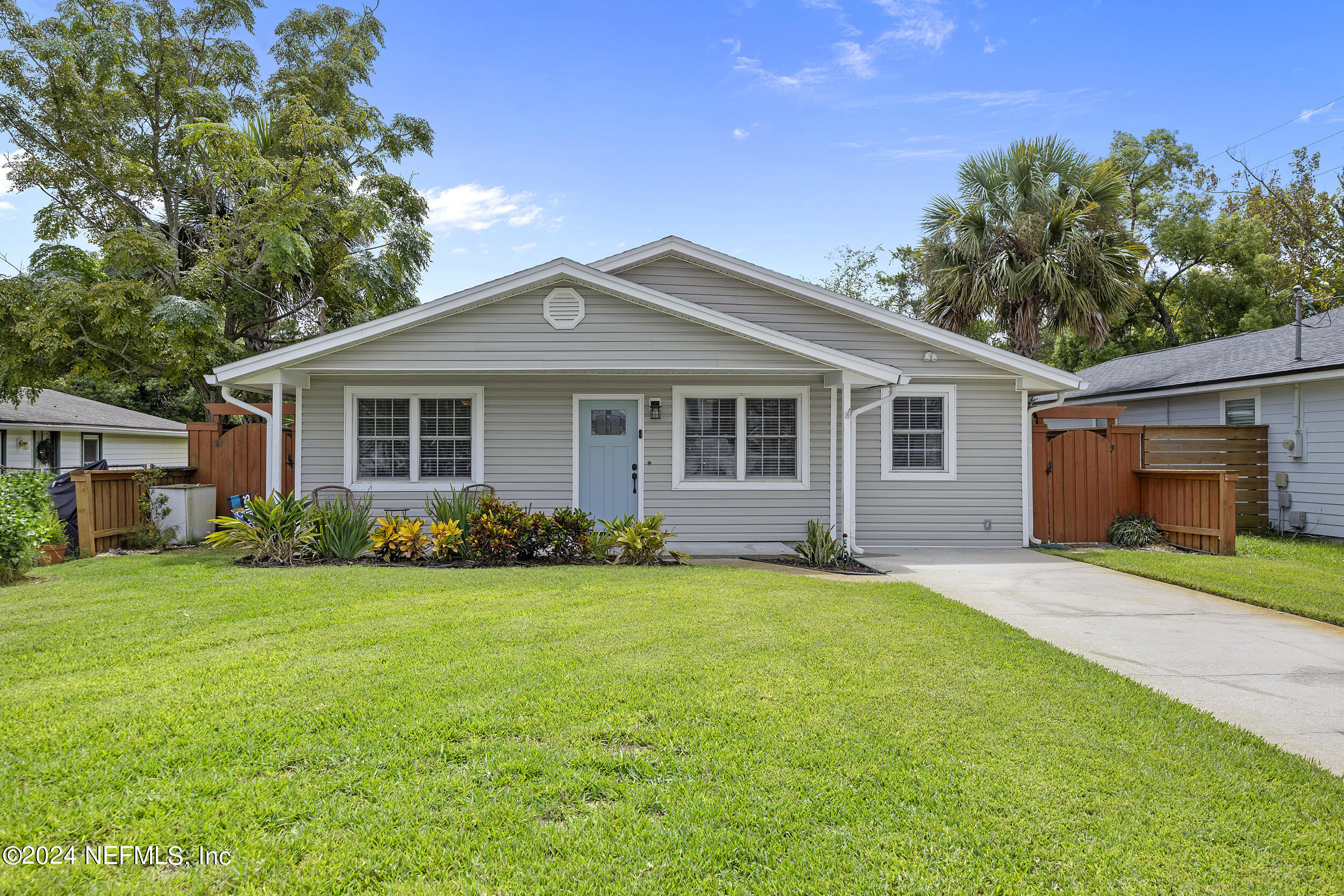 a front view of a house and a yard