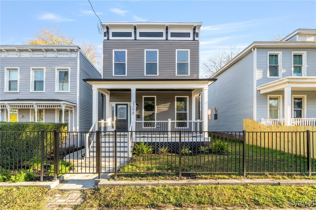 Italianate home featuring covered porch