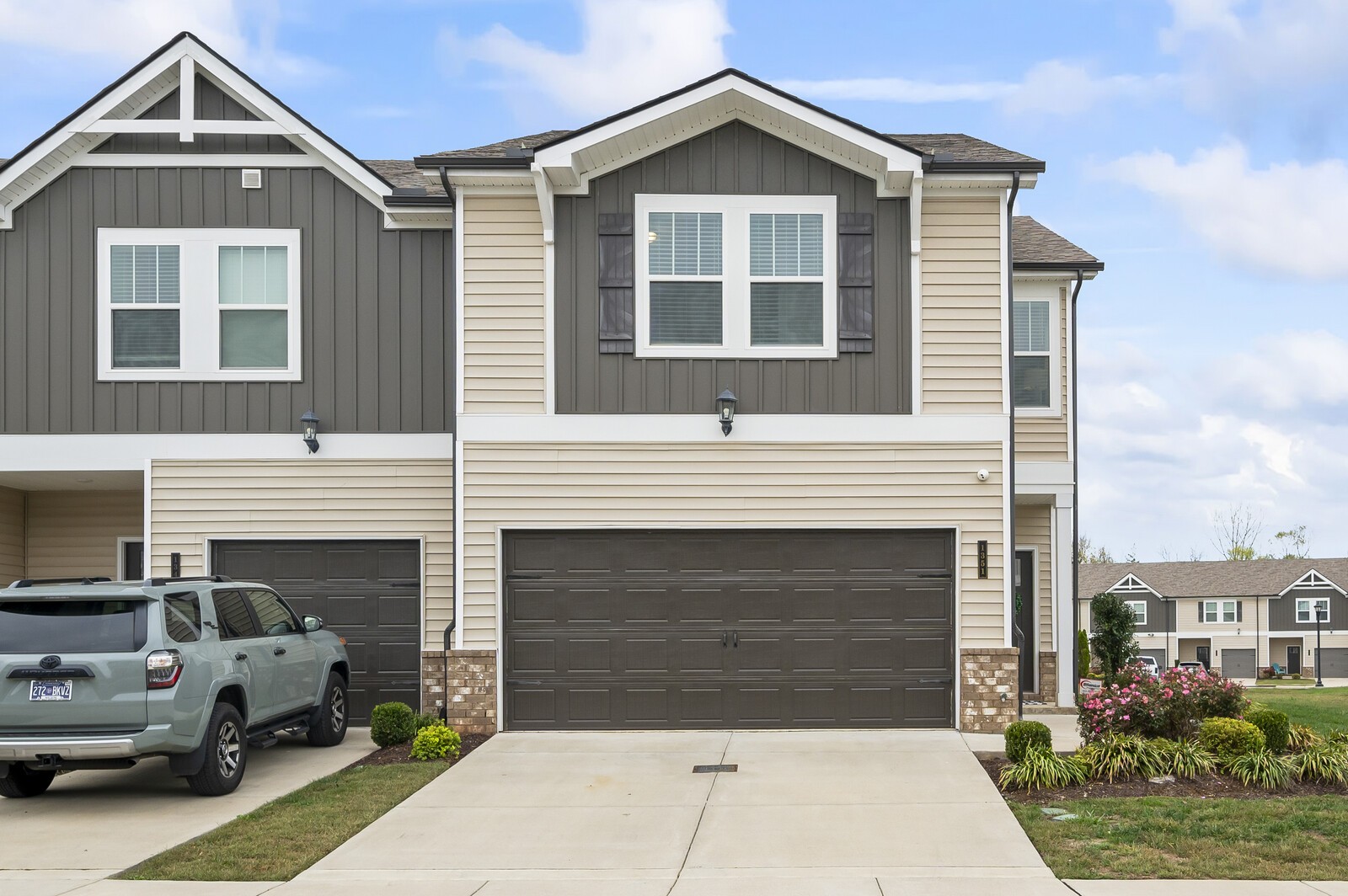 a front view of a house with parking