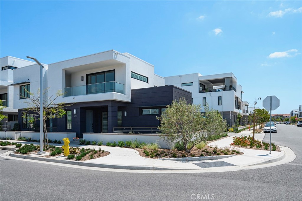 a front view of a building with street view