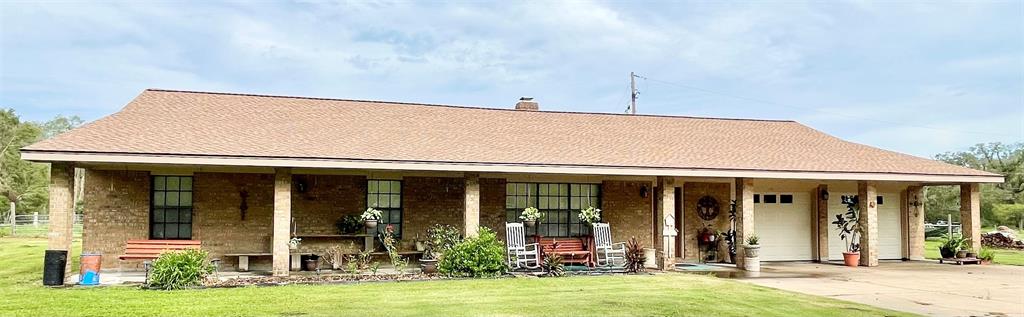 front view of a house with a swimming pool