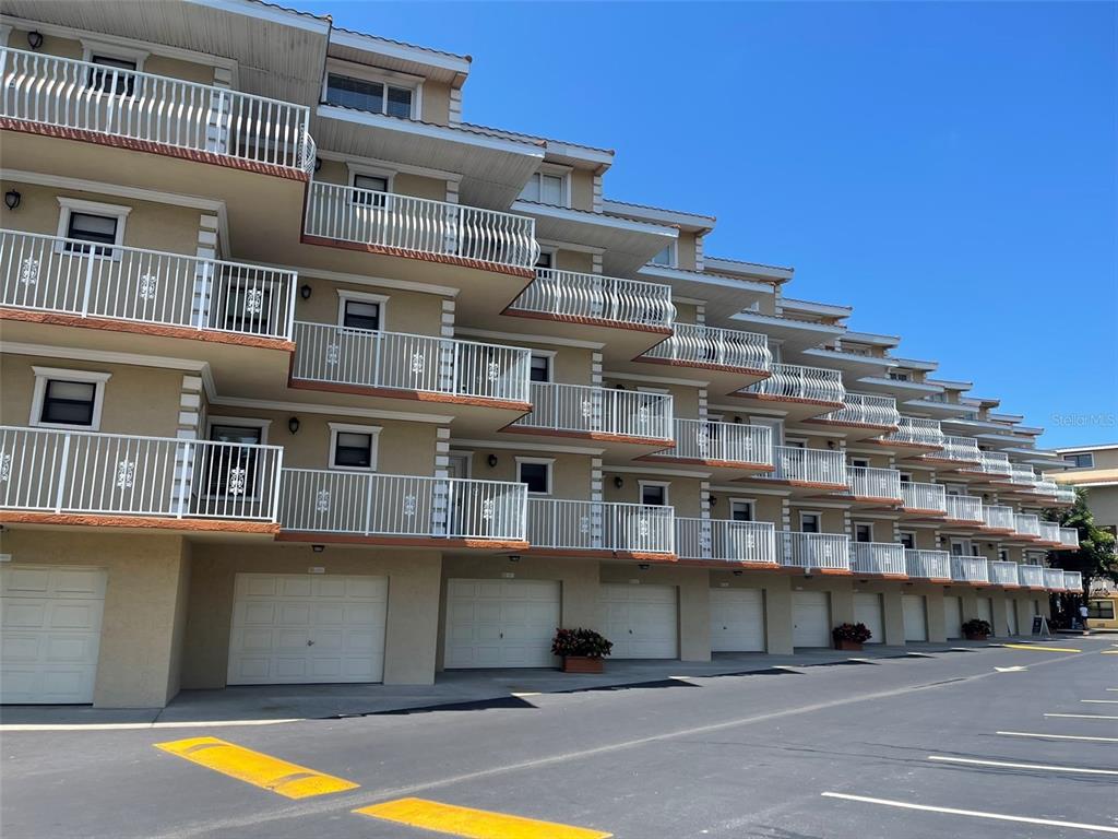 a view of a building with a swimming pool